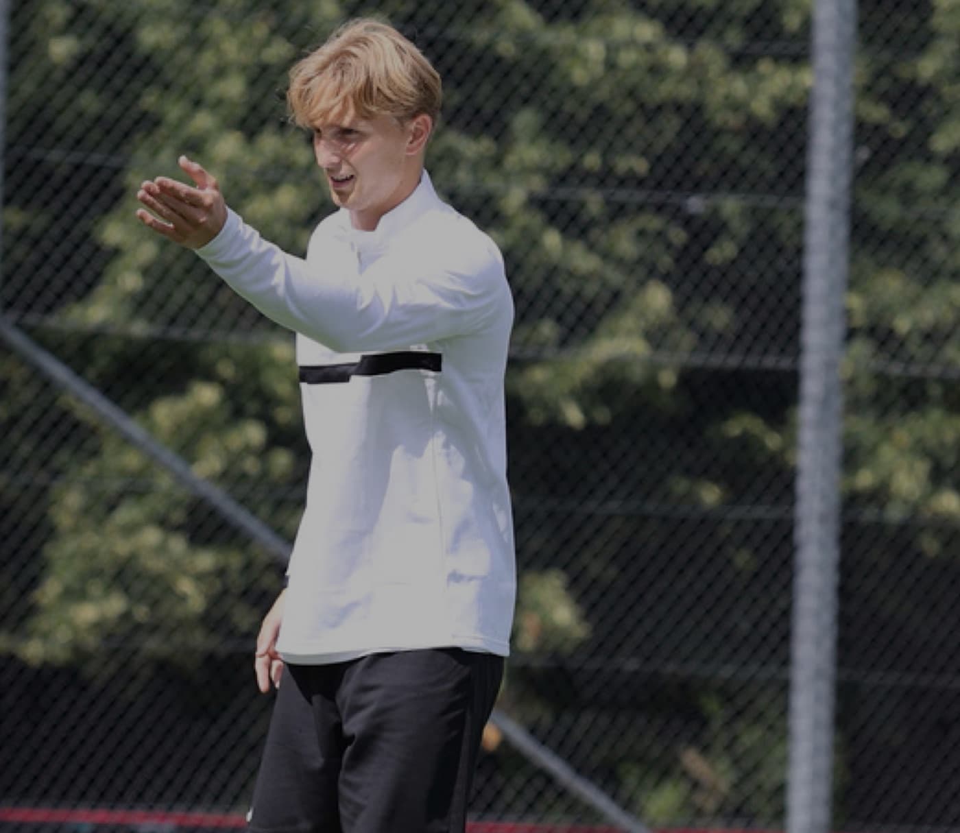 Cooper Wiberg coaching on the training pitch